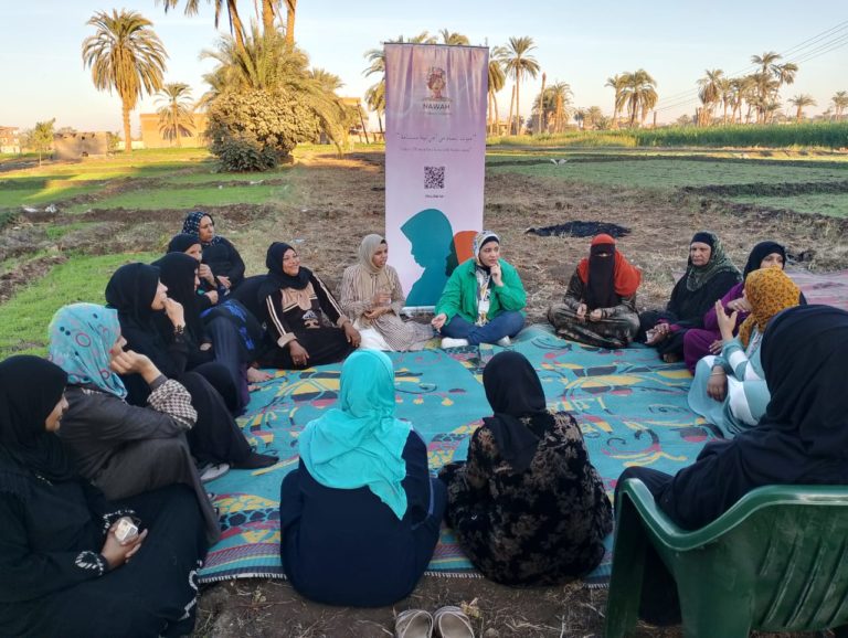 Women farmers in a Nawah Network storytelling circle outdoors